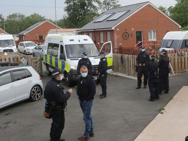 Police at Leighton Arches caravan site in June 2021
