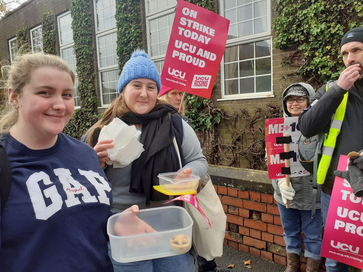 Students Jo Flower and Pahaghiota Hole handed out mince pies and support to their lecturers