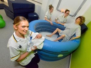Midwifery Skills Lab at University of Wolverhampton's Sister Dora building, pictured are Sophie Chester, Beth Proctor and Tiffany Parker