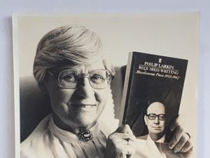 The photograph of Vera Thorpe with the book, both of which are included in the lot