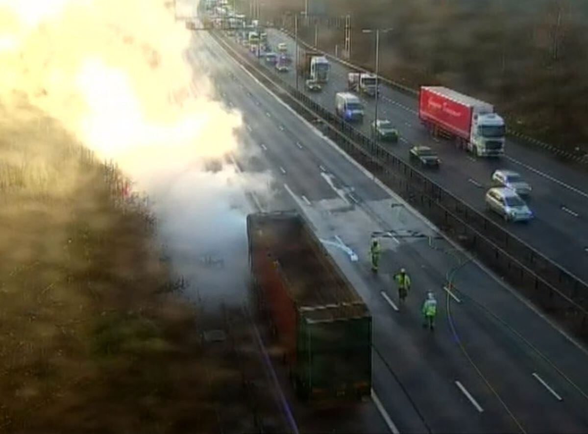 Fire crews putting out the lorry blaze on the M6. Photo: National Highways