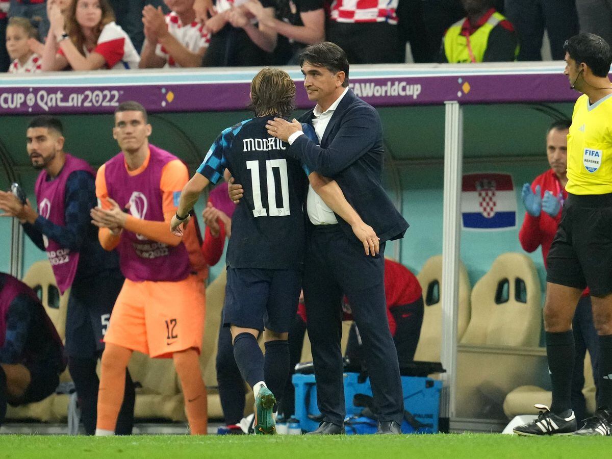 Croatia’s Luka Modric is greeted by Croatia manager Zlatko Dalic after being substituted