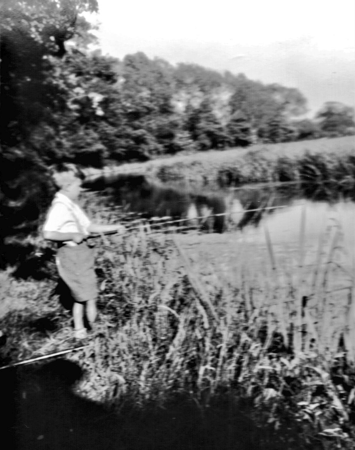The start of it all for five-year-old Derek, fishing on the River Tern near Wellington in 1947.