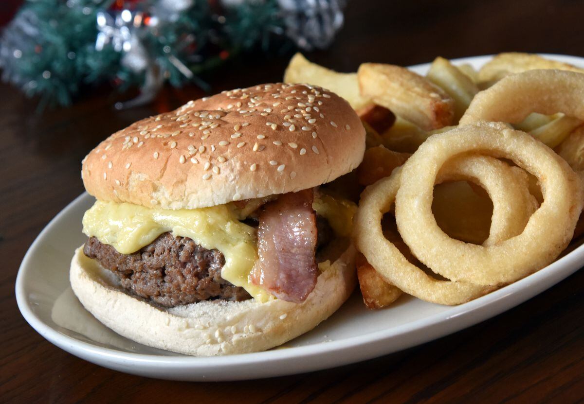 The Dog and Davenport's burger with bacon, chips and onion rings