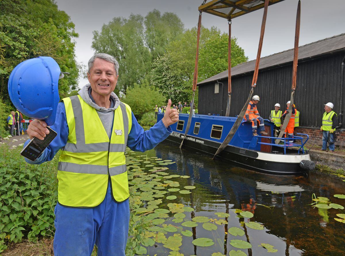 Councillor Tim Nelson when the canal narrowboat was lifted onto the canal at Newport, using a big crane. 