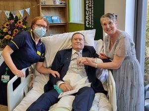 Pip Page-Davies, Macmillan specialist nurse, with patient Phil Bryers and Shirley Bryers, formerly Astbury, during their wedding reception