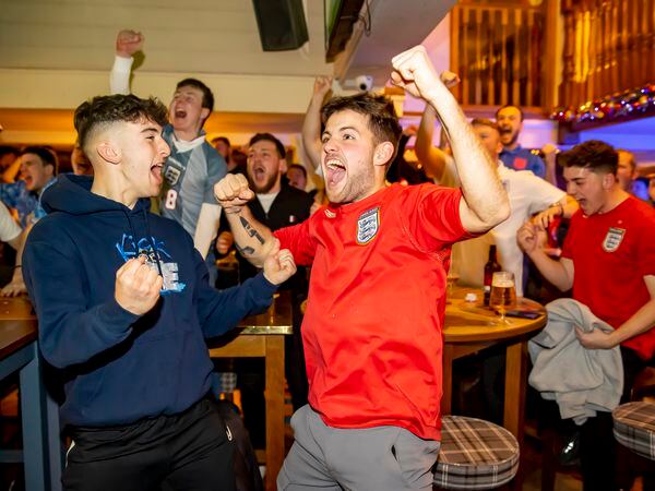 Fans celebrate after England score to make it 2-0. Photo: Jonathan Hipkiss.