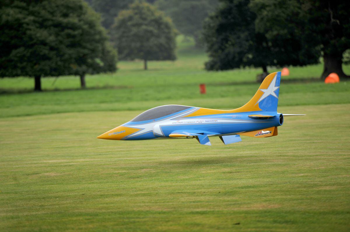 A jet plane flies low to the ground at the Weston Park Airshow International