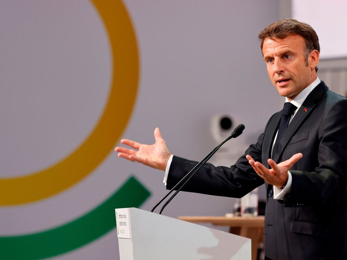 French President Emmanuel Macron delivers a speech during the opening session at the New Global Financial Summit in Paris