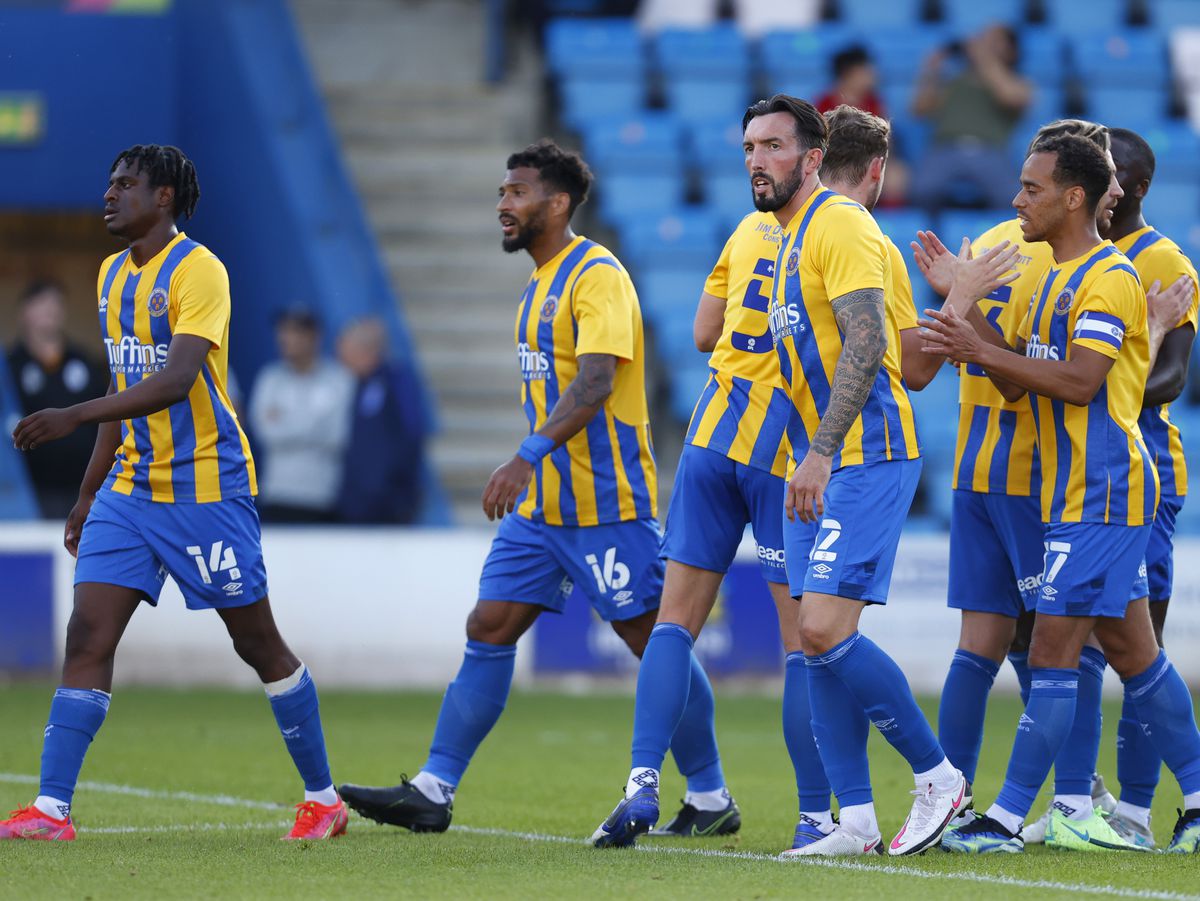 Ryan Bowman of Shrewsbury Town celebrates with his team mates after scoring a goal to make it 1-1.