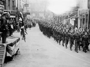 nostalgia pic. Wellington. Combined platoons of the local Home Guard parade through market Square, Wellington, on Armistice Day 1940. It was commemorated even during the Second World War, made more evocative by the number of servicemen involved. Library code: Wellington nostalgia 2006.
 