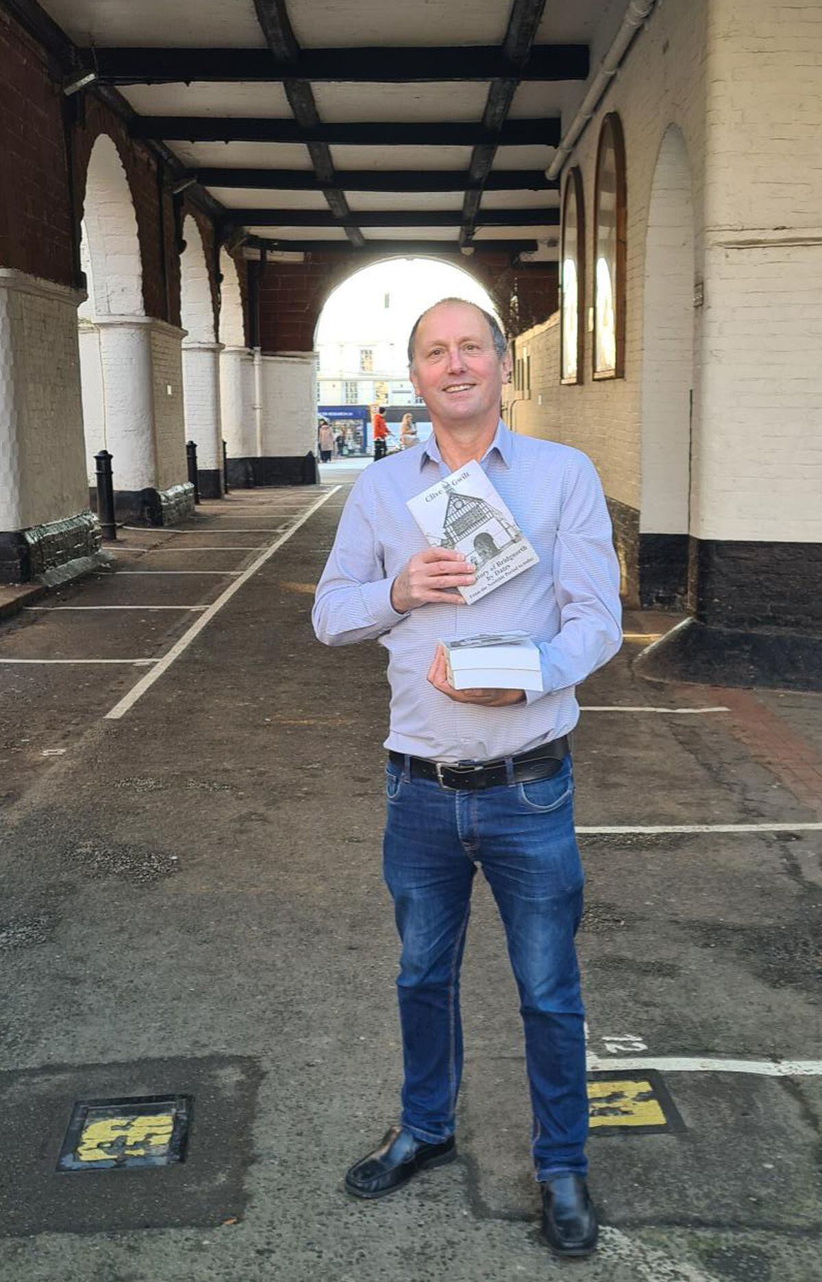 Clive by Bridgnorth Town Hall with his latest book.