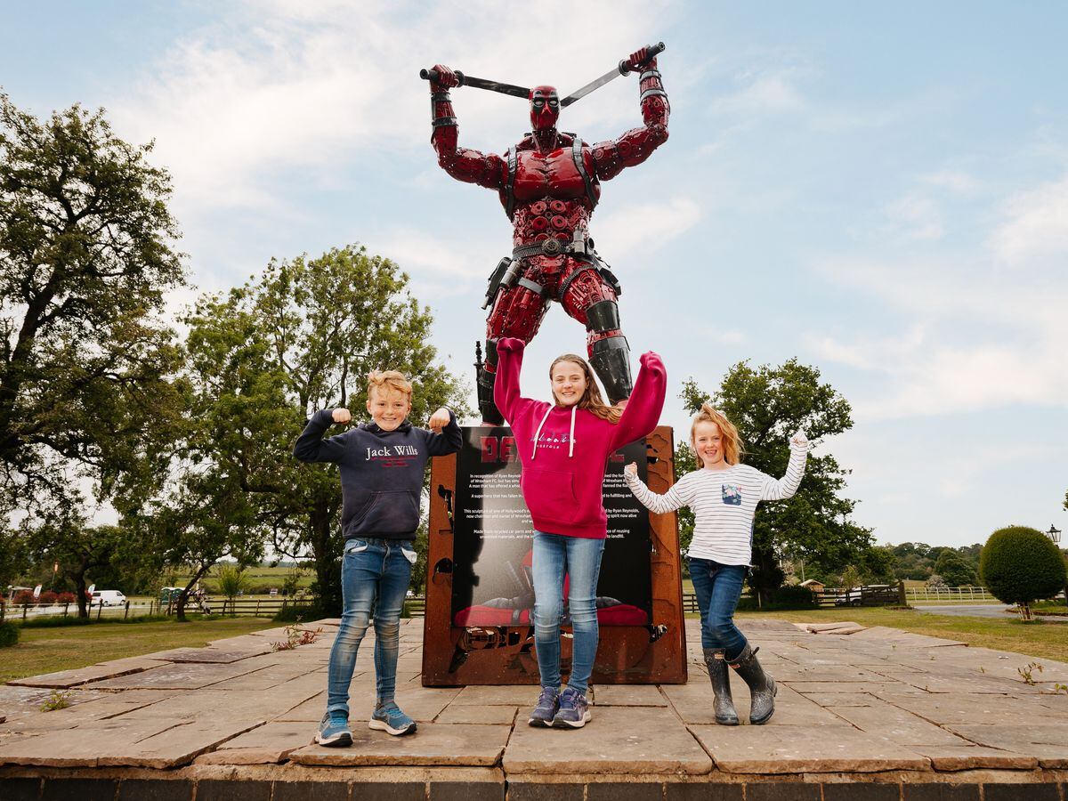 Marvelling at the Deadpool sculpture are Freddie Terrell-Jones, eight, Lily Terrell-Jones, 10 and Primrose Terrell-Jones, six - from Claverley