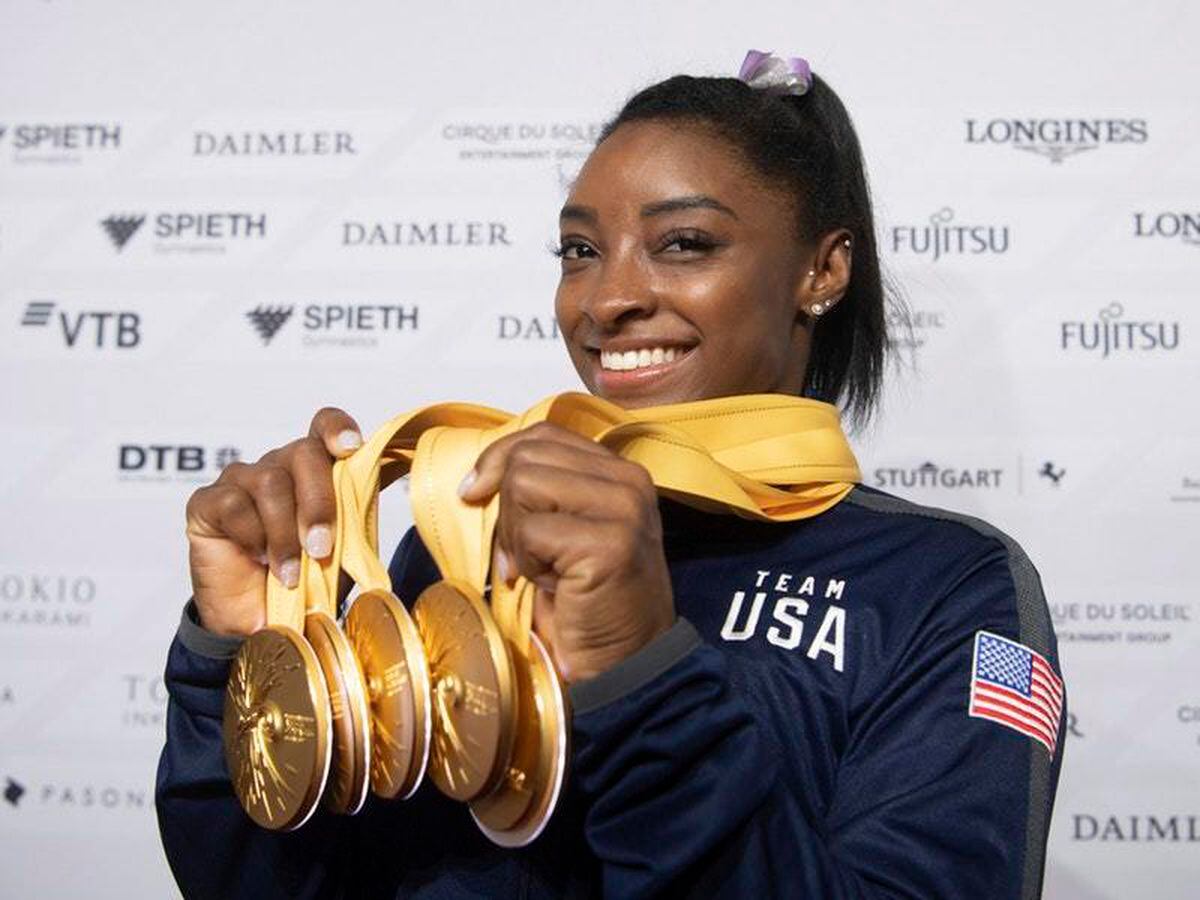 Simone Biles with some of her gold medals