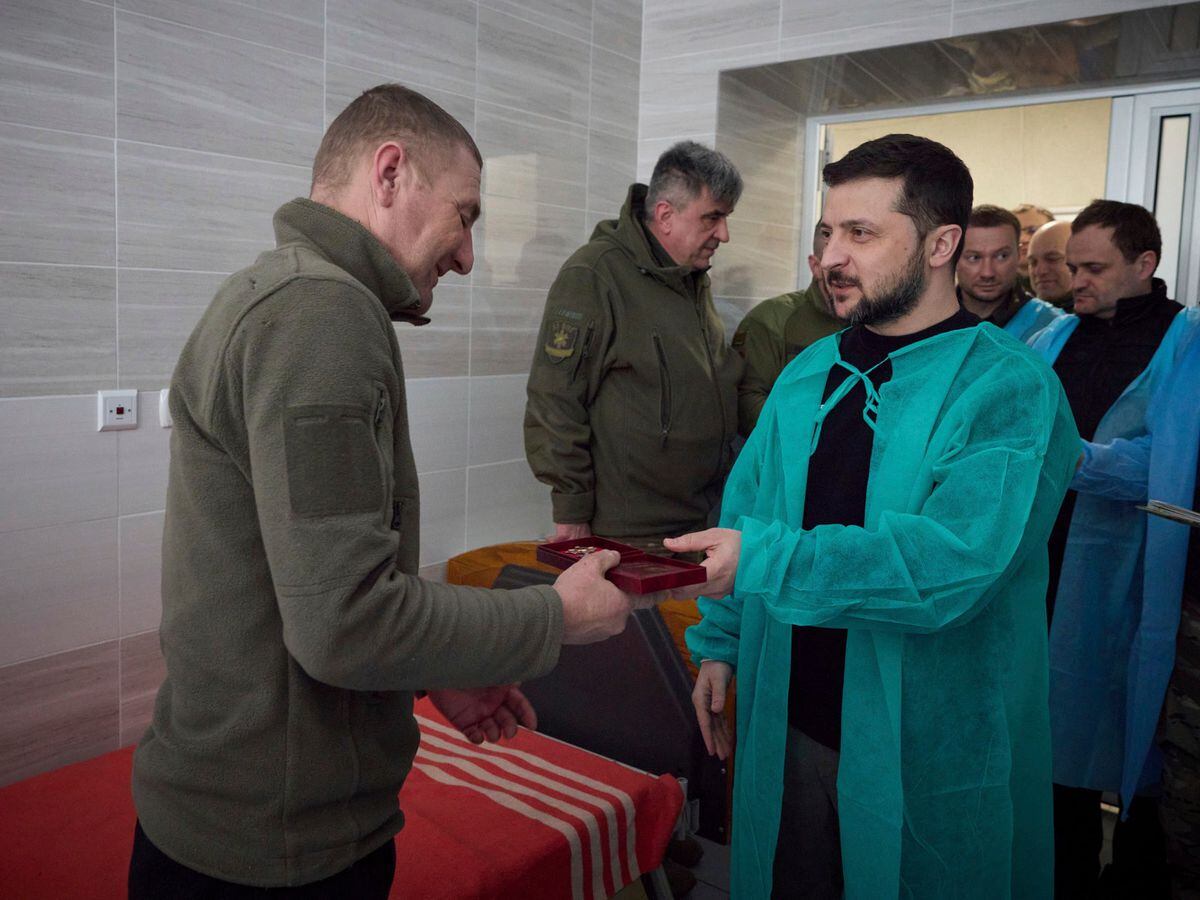 Volodymyr Zelensky awards a soldier in hospital in Donetsk region on Wednesday
