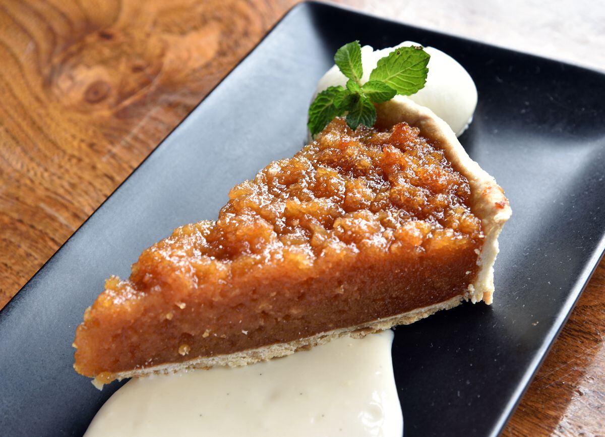 Sweet on it – treacle tart with vanilla sauce