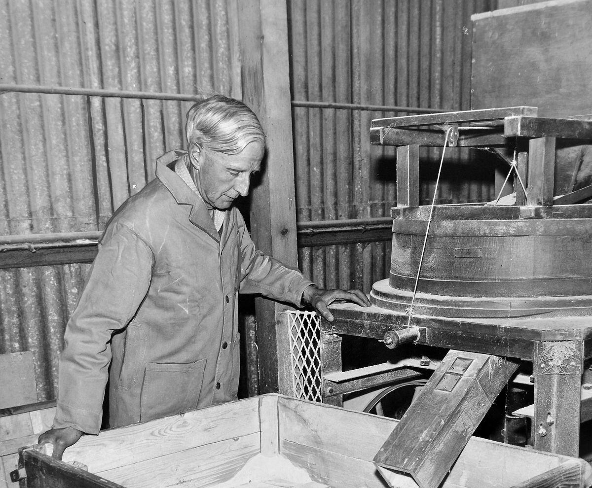 A 1960 photo of Sam Mayall in the mill where the wheat was ground.
