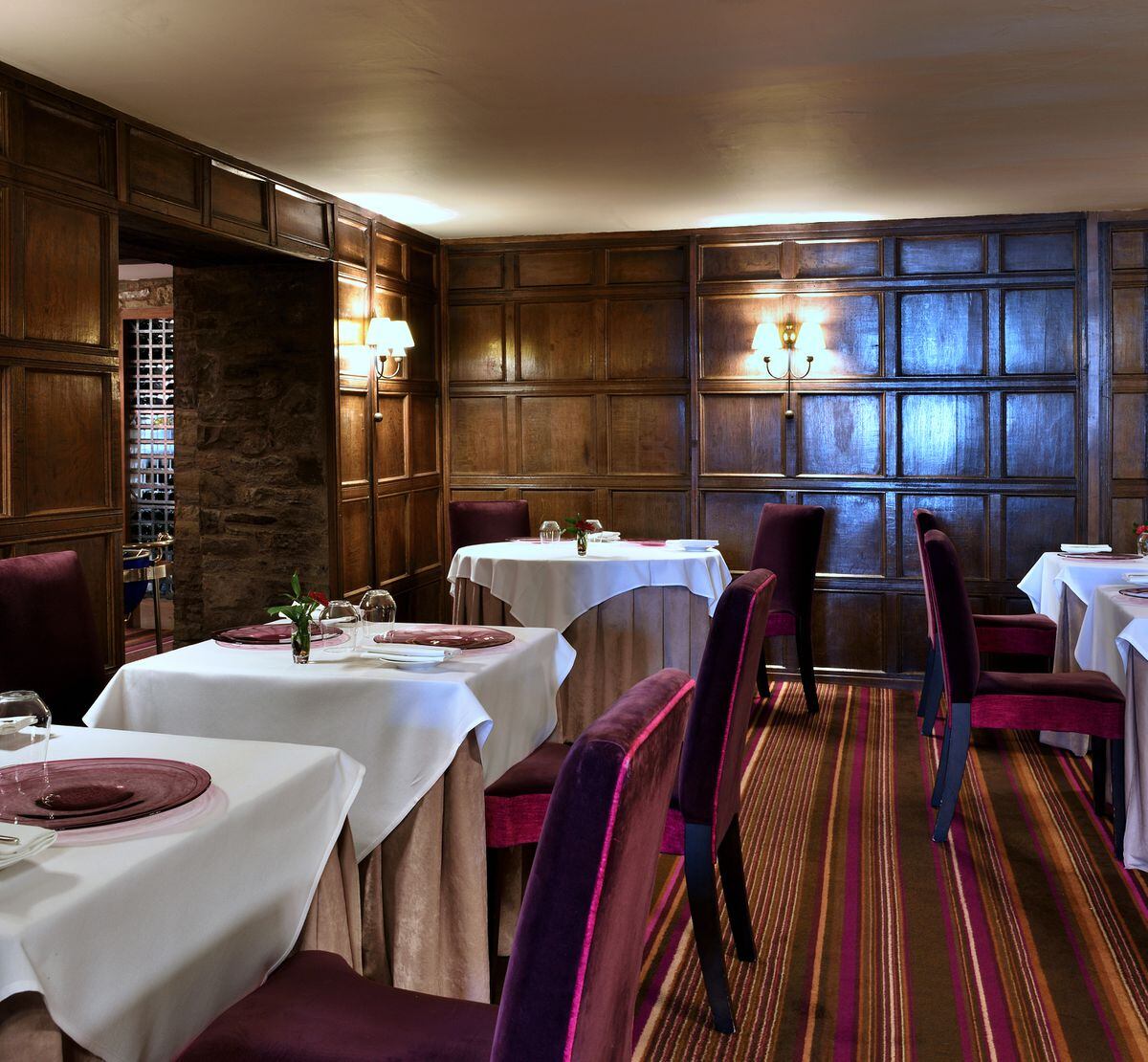  The beautiful oak-panelled dining room