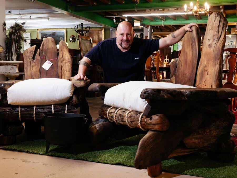 Stu Bowen with the driftwood chairs have arrived at Old Mill Antique Centre in Bridgnorth