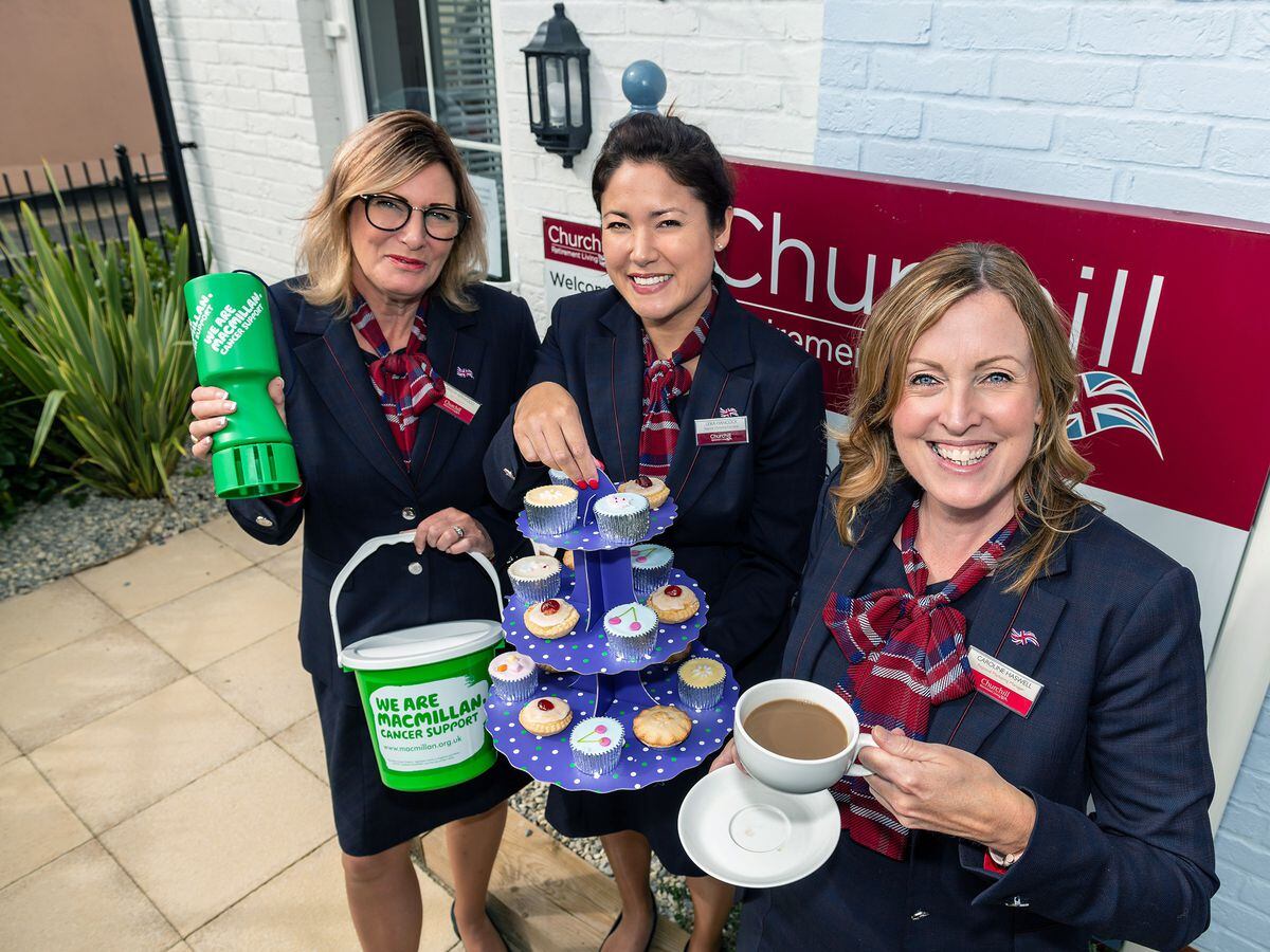 Staff at Churchill Retirement Living preparing for their coffee morning for charity