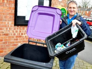 Councillor Ian Nellins with one of the new bins