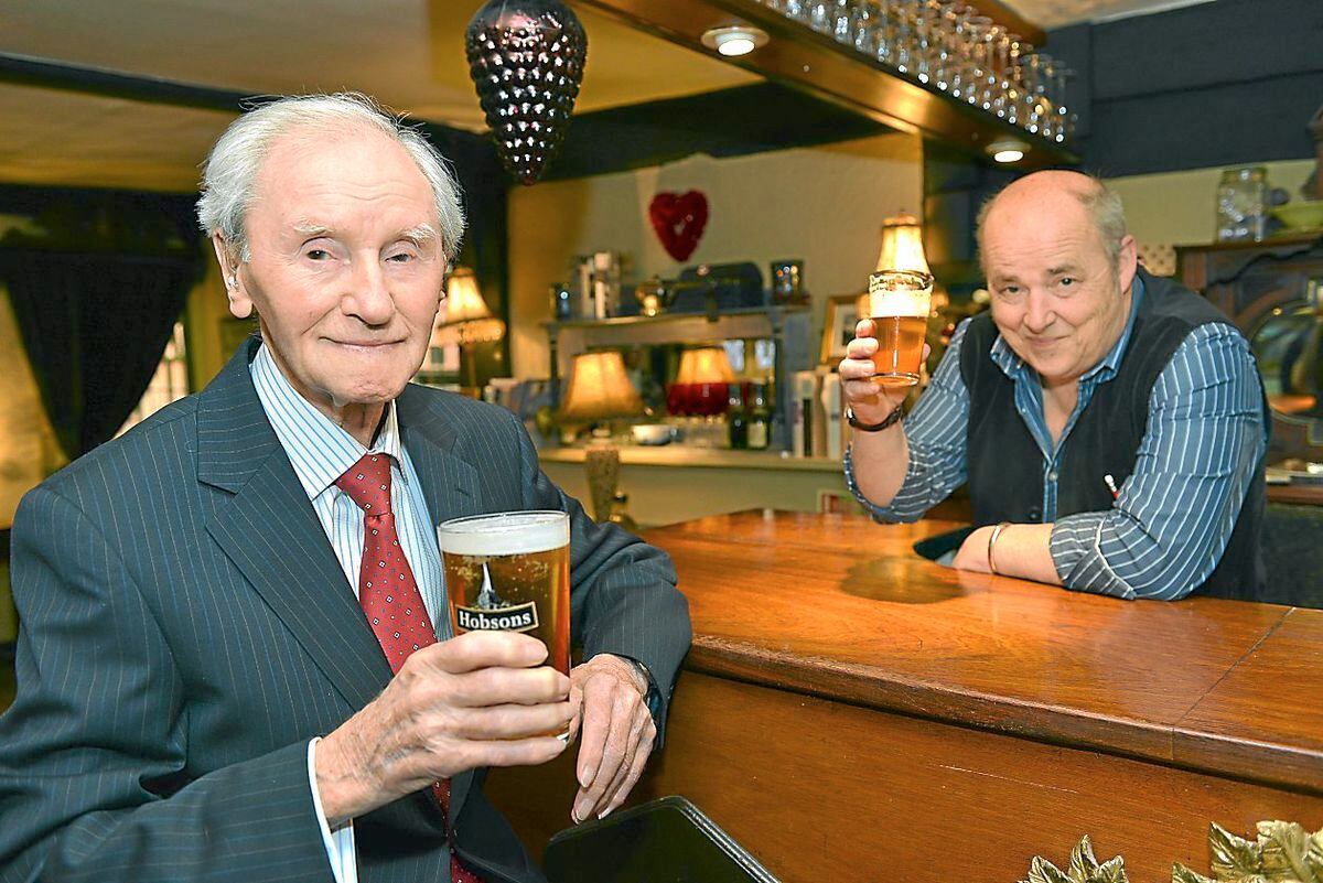 Norman Rushworth celebrated his 100th birthday in 2013 with a pint of his favourite in the Golden Cross with landlord Gareth Reece