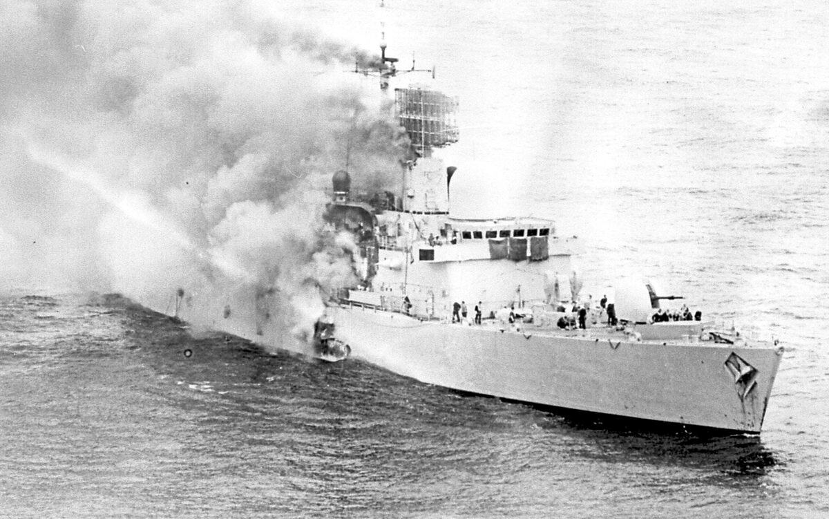 HMS Sheffield burns after being hit by an Exocet missile.