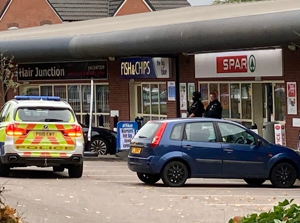 Armed police were on the scene at Spar in Leegomery