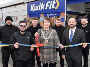 Shrewsbury deputy mayor Cllr Becky Wall with manager Aidan Catterson, operations manager Mike Ellis, and the Kwik Fit team