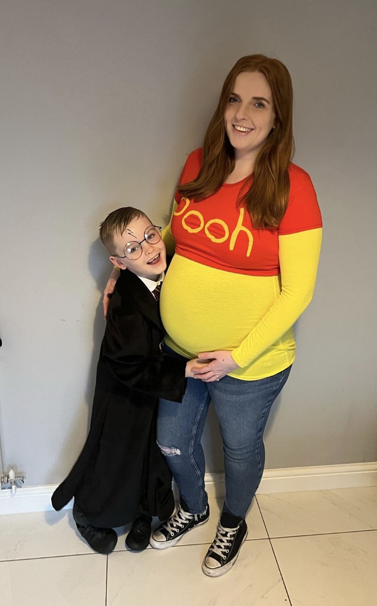 Heath Smith as Harry Potter and Abbie Manders as Winnie the Pooh 