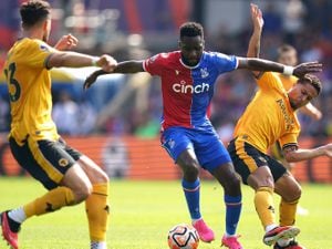 Crystal Palace's Odsonne Edouard battles for the ball with Wolves' Max Kilman and Joao Gomes. Picture: Adam Davy/PA Wire.
