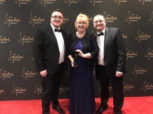 Charity fundraisers Daniel, Debbie and Wilf Glaze were given an award for "Community Excellence"