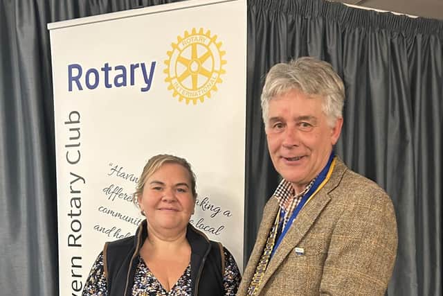 President Johnathan Callwood presents latest Shrewsbury Severn Rotary Club member Gemma Wasteney with her lapel badge.