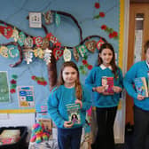 Pupils from Lantern Primary Academy with their free books following their competition win