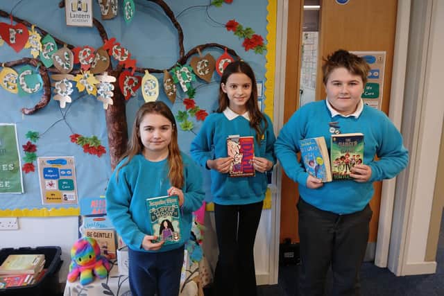 Pupils from Lantern Primary Academy with their free books following their competition win