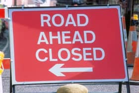 The road was closed after a collision.