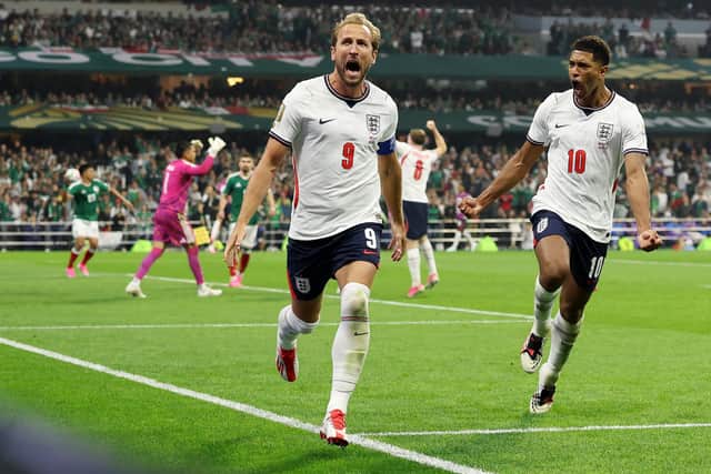 Harry Kane #9 of England celebrates with Jude Bellingham #10 after converting a penalty for his team’s third goal during the FIFA World Cup 2026 Round of 16 match between Mexico and England at Mexico City Stadium on July 05, 2026 in Mexico City, Mexico. (Photo by Charlotte Wilson/Getty Images)