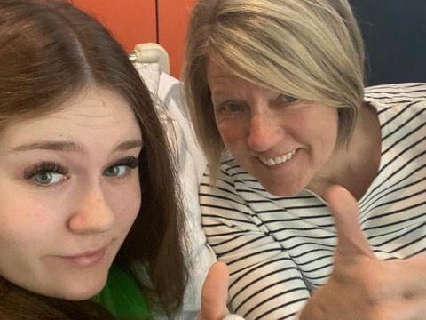 Grace pictured with her mum Annette before surgery to get a biopsy and Hickman line inserted.